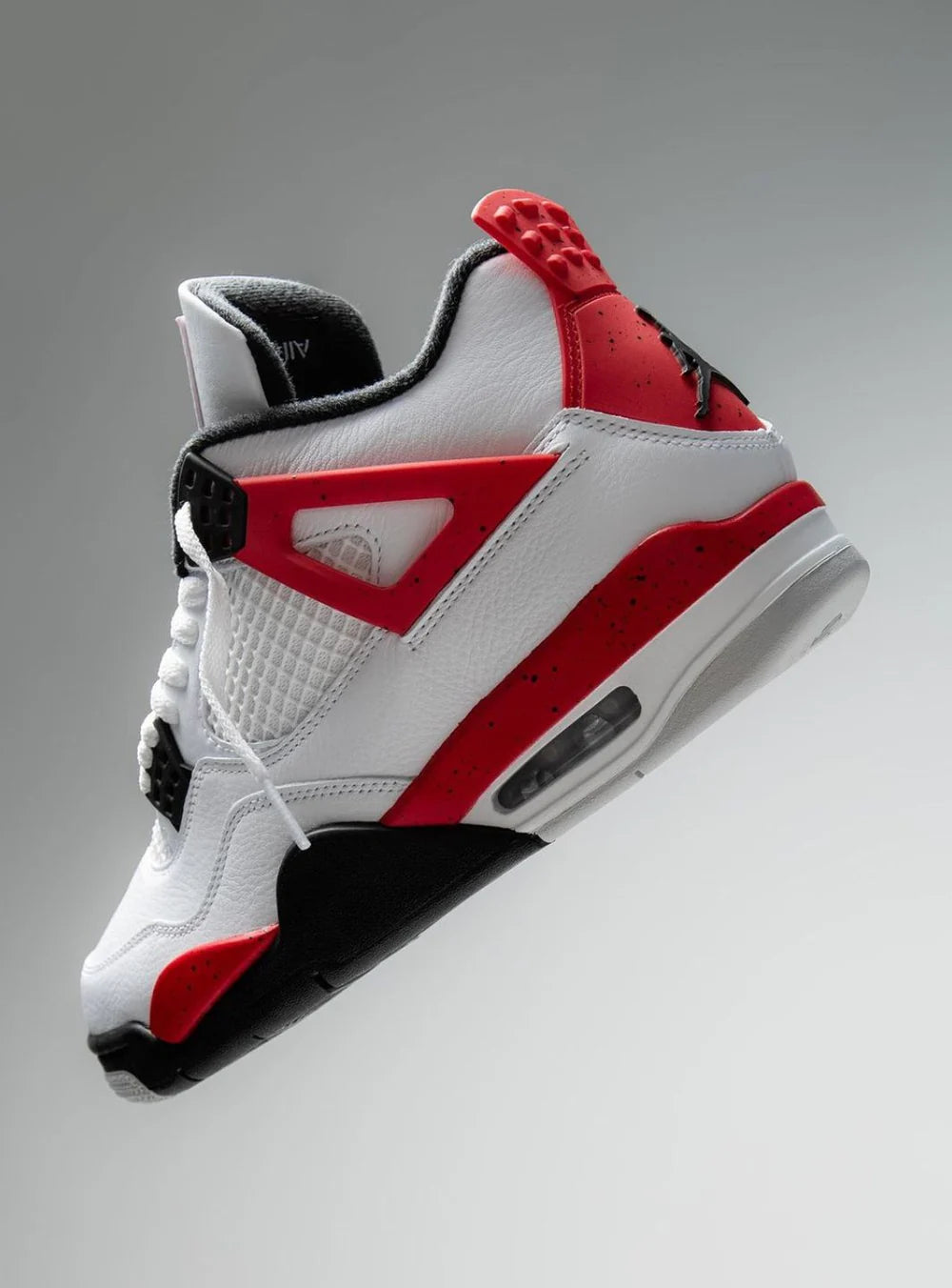 Air Jordan 4 Red Cement vista laterale sinistra